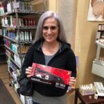 a client hold a product