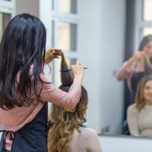 women getting her hair done