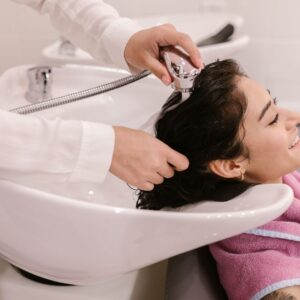 women getting her hair washed