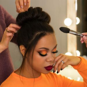 women getting hair and makeup done