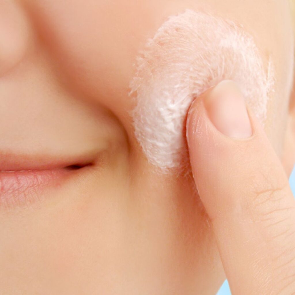 lotion on cheek