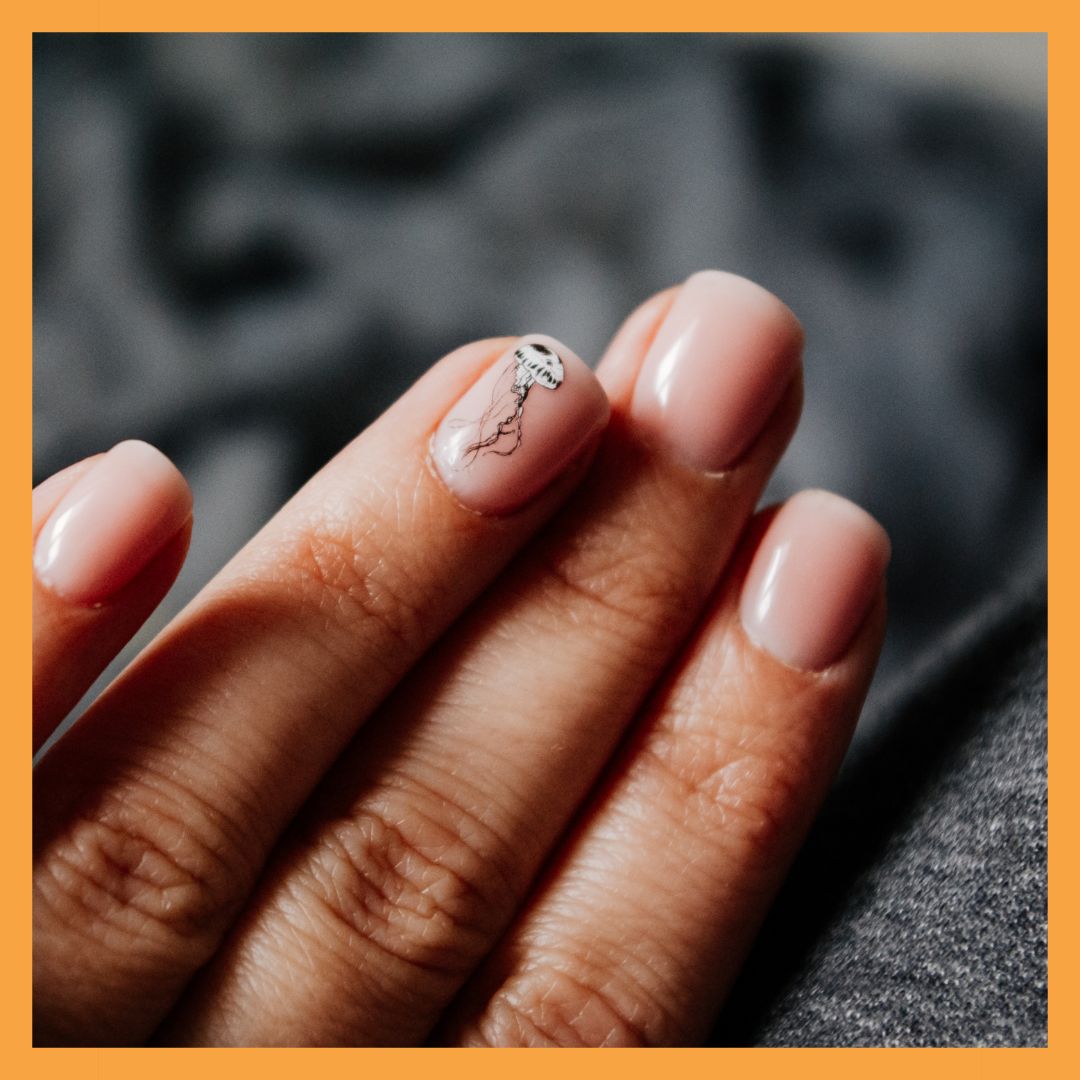 nail with painted design on it