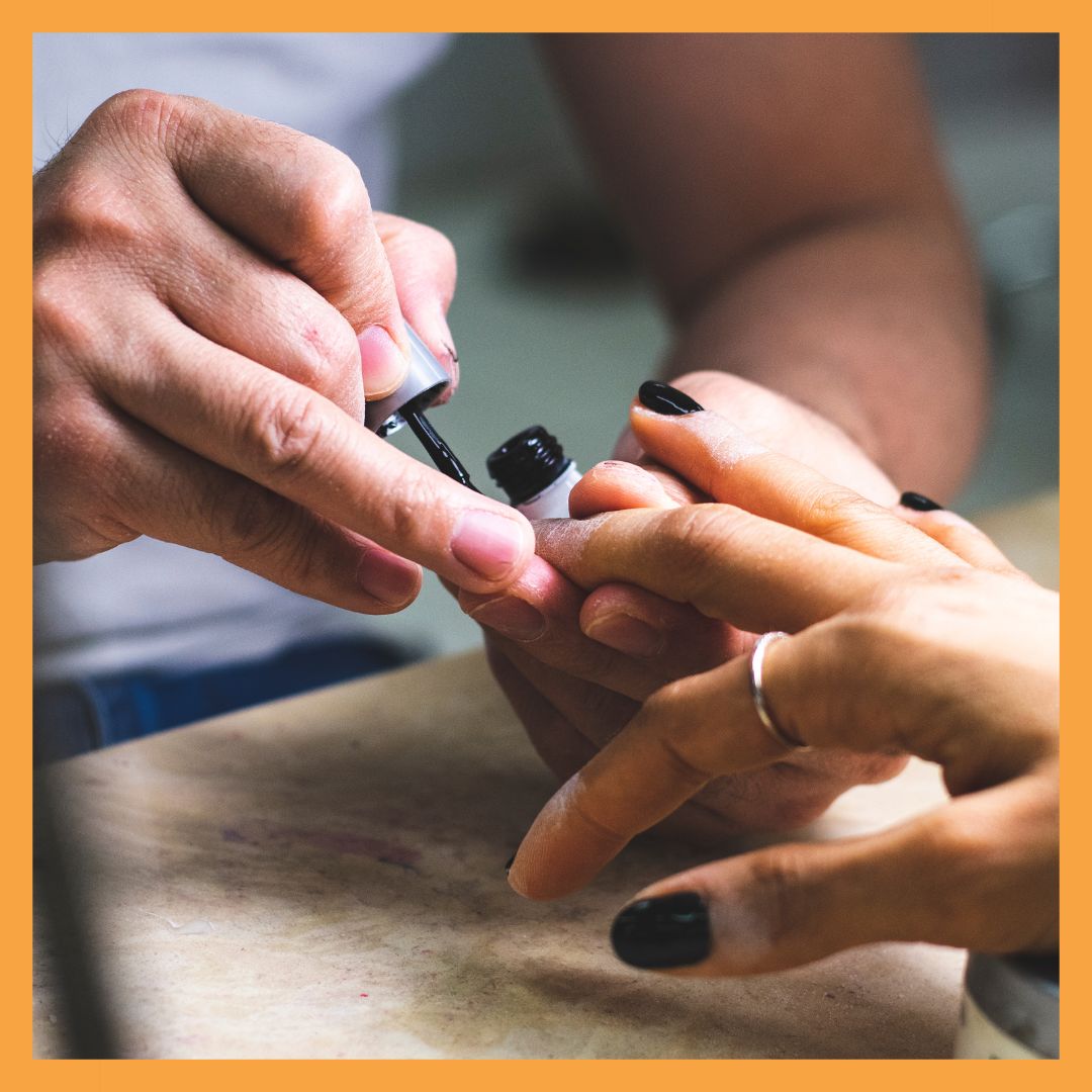 nails being painted black
