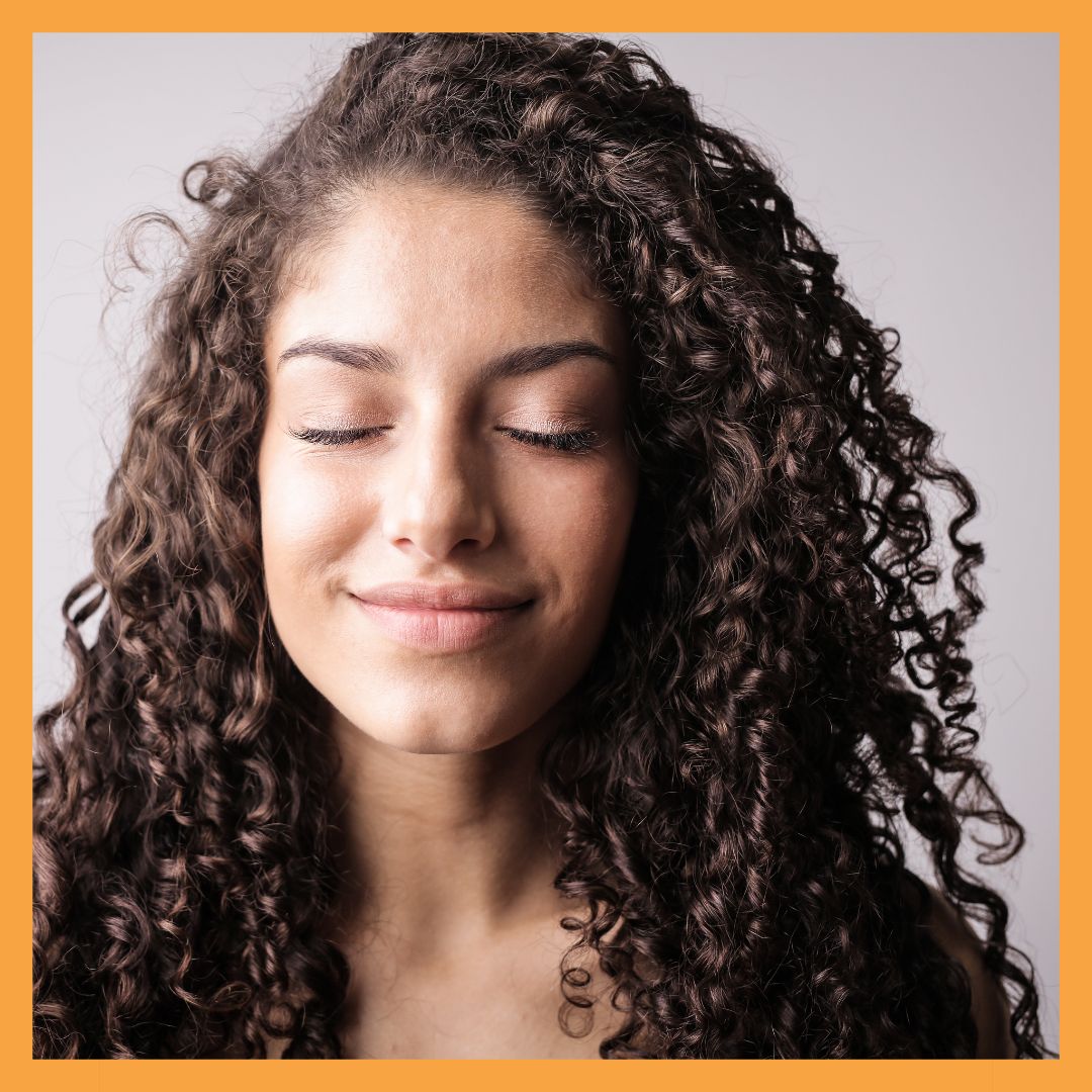 woman with brown curly hair