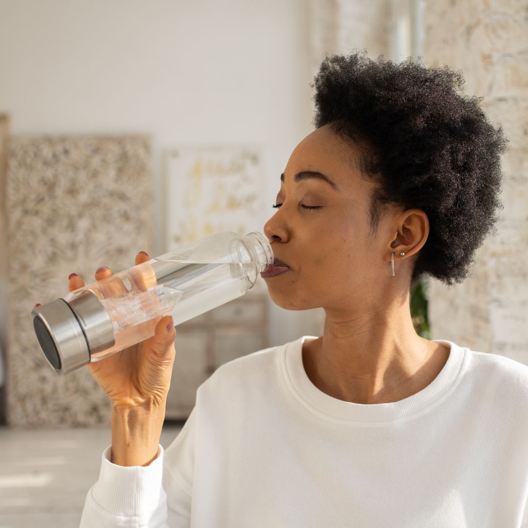 a woman drinking water