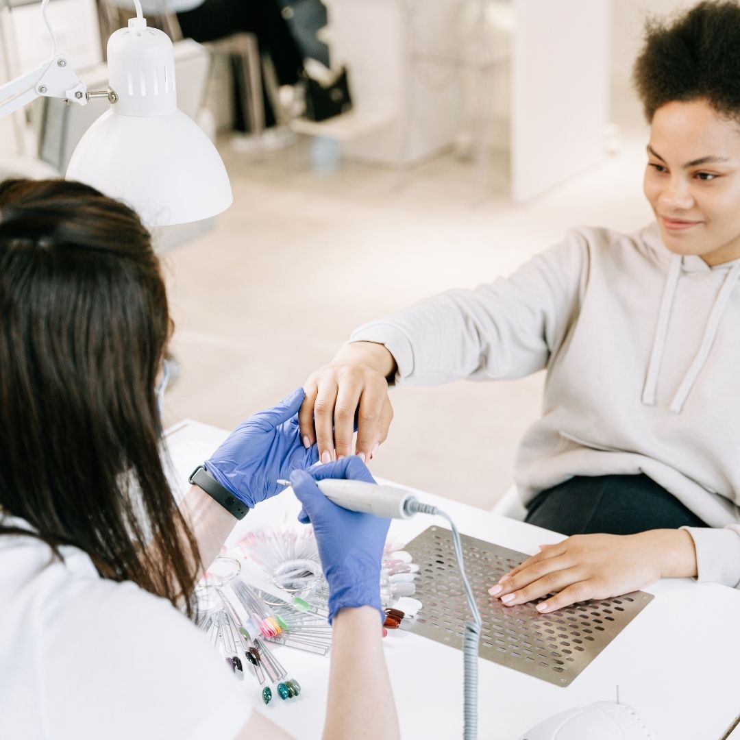 woman getting a manicure